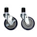 A pair of Eagle Group zinc swivel stem casters with rubber wheels. Each caster has a black and white rubber wheel.