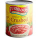 A white #10 can of Furmano's Chunky Crushed Tomatoes with a spoon in it.