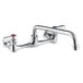 A chrome Regency wall mount faucet with two handles and two faucets.