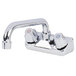 A chrome Regency wall mount bar sink faucet with two handles and two faucets on a white background.