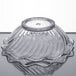A Carlisle clear glass tulip berry dish with a lid.