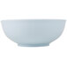 A white bowl with a blue rim on a white background.
