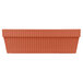 A Tablecraft copper cast aluminum rectangular bowl with a ribbed surface.