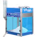 A blue and silver Paragon Polar Point snow cone machine with a blue container.