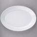 A white Carlisle oval platter on a gray surface.