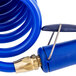 A blue coiled polyurethane hose with a metal clip and a blue spray valve handle.