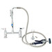 A T&S deck mount pet grooming faucet with hose and handle.