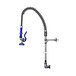 A blue and black T&S wall mount pet grooming faucet with a hose.