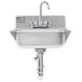 An Eagle Group stainless steel hand sink with faucet and drain on a white counter.