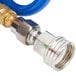 A blue T&S Pet Grooming hose with a gold and blue connector.
