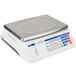 A white Cardinal Detecto digital price computing scale with a silver top.