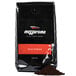 A black package of Ellis Mezzaroma Dark Decaf Ground Espresso with white text and a red label.