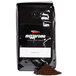 A black bag of Ellis Mezzaroma Dark Regular Ground Espresso with a white label.