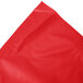 A Classic Red plastic table skirt on a white background.