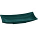 A hunter green rectangular cast aluminum platter with a white speckle design and a handle.