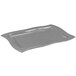 A grey rectangular Tablecraft granite platter with a curved edge.