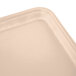 A light peach rectangular Cambro fiberglass tray with a black border.