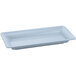 A gray rectangular cast aluminum platter on a counter.