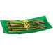 A green Tablecraft cast aluminum flared rectangle platter with asparagus on it.