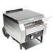 A Hatco TQ-10 conveyor toaster with a metal rack on top.