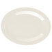 A white oval platter with a diamond ivory rim on a white background.