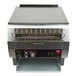 A close up of a Hatco stainless steel conveyor toaster with a metal rack on top.