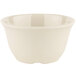 A GET Diamond Ivory melamine bowl with a curved edge on a white background.