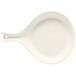 A white round melamine skillet with a handle.