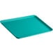 A green Cambro market tray with a plastic handle.