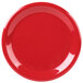 A close-up of a red Carlisle Sierrus melamine plate with a narrow rim.
