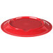 A red Carlisle melamine plate on a table.