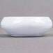 A white Carlisle melamine butter dish on a grey surface.
