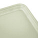 A rectangular white Cambro fiberglass tray with a curved edge.
