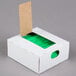 A white box with green strips inside.