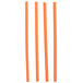 A group of orange plastic twist ties on a white background.