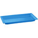 A sky blue rectangular cast aluminum Tablecraft platter with a handle.