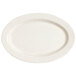 A white oval melamine platter with speckled design.