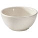A white bowl with a speckled surface.