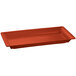 A Tablecraft copper rectangular tray with a rounded edge.