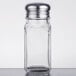 A clear glass jar with a silver lid with Tablecraft Square Salt and Pepper Shakers inside.