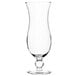 A clear Libbey Squall Hurricane cocktail glass with a stem.