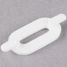A white plastic Ketchum Manufacturing number 0 deli tag insert with a hole.