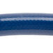 A close up of a blue T&S water appliance hose with white connectors.