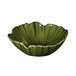 A green melamine bowl with a Tropicana leaf design on the curved edge.