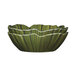A close-up of a green Elite Global Solutions melamine bowl with palm leaf designs in green and black.