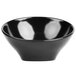 An Elite Global Solutions black melamine bowl with a slanted edge.