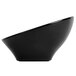 A close-up of a black Elite Global Solutions slanted melamine bowl with a curved edge.