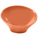 An orange Elite Global Solutions Pappasan bowl with a white interior and rim.
