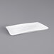 A white rectangular Elite Global Solutions melamine tray with a small handle.