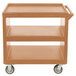 A coffee beige Cambro plastic utility cart with wheels.